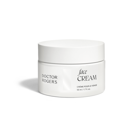 White Doctor Rogers Face Cream bottle .This top seller deeply hydrates and plumps skin with a blend of squalane, niacinamide, shea butter, and glycerin. Ideal for dry, sensitive, and mature skin types, it reverses dullness, relieves redness, and visibly improves fine lines and wrinkles while strengthening the skin barrier. 